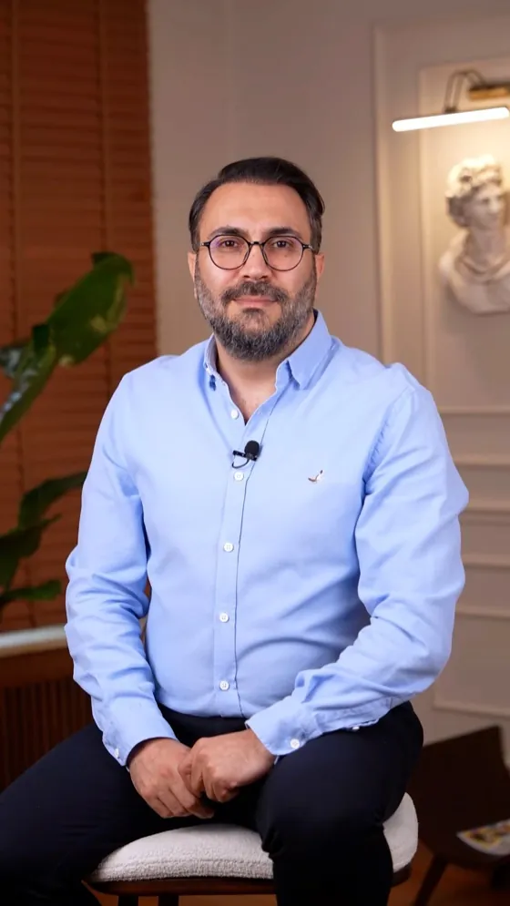 Portrait of Op. Dr. Emre Türkmen at his clinic